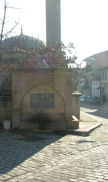 View of fountain along courtyard wall