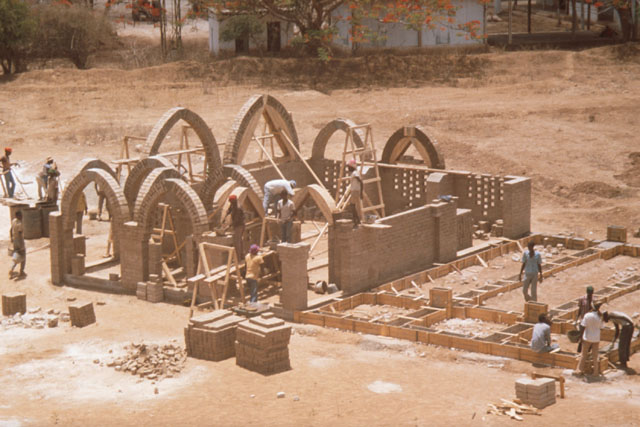 Elevated view showing brick construction with arches