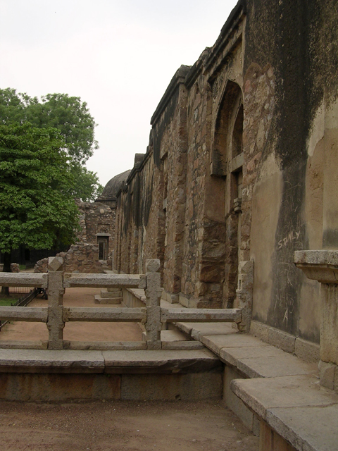 Looking west from front court of tomb at the madrasa wing