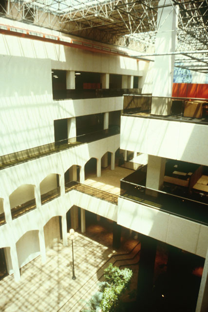 Interior view from upper story down to atrium