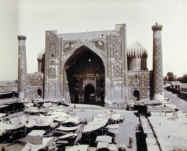 General view taken from roof of Ulugh Beg Madrasa, with market underway in Registan Square