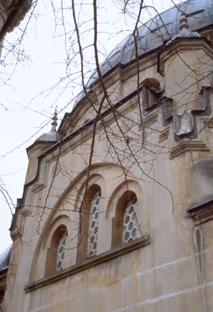 Exterior detail from southwest façade, showing stepping of the cornice line around mini turrets that flank the dome