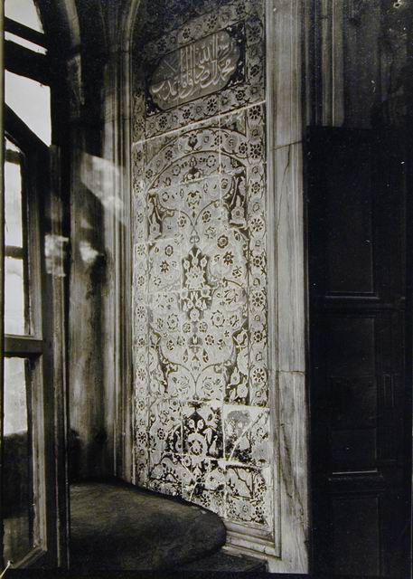 Interior detail; tile panel in vestibule to the left of doorway