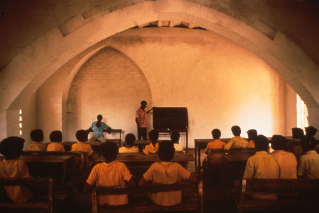 Interior view showing open classroom with elongated vaults