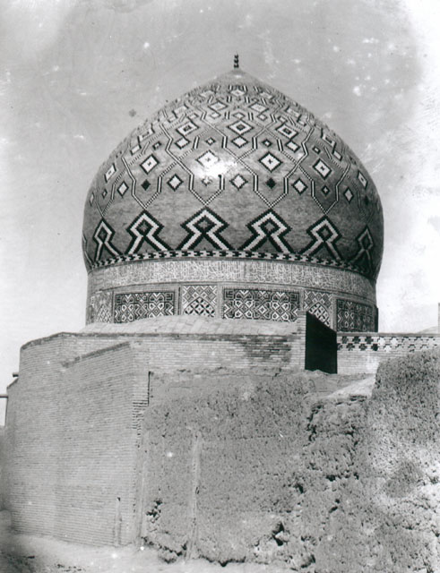Exterior view of dome with geometric glazed tile ornament