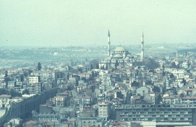 Exterior view of mosque in its neighborhood, as seen from south, with the Golden Horn in the background