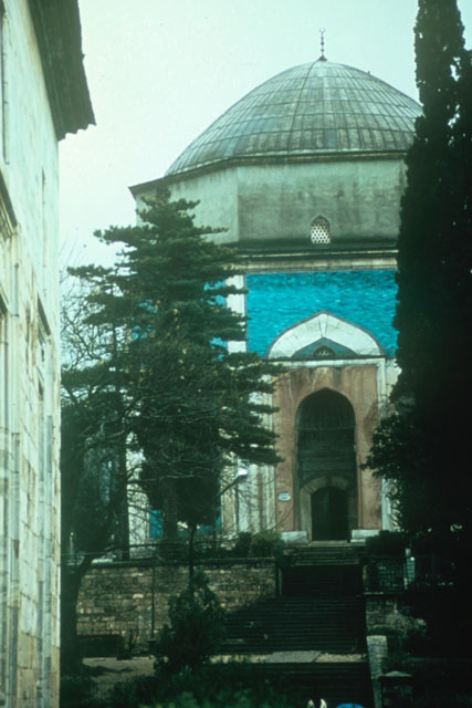Exterior view from northwest, with mosque wall seen on the left