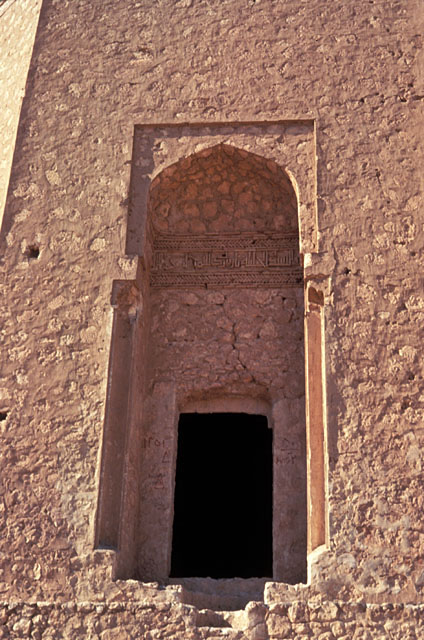 View of the entrance with Kufic inscription seen above doorway