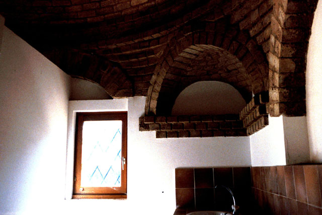 Interior detail showing brick arch