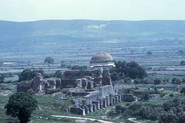 Elevated view from north showing the dome of the mosque behind the ruins of ancient Miletus
