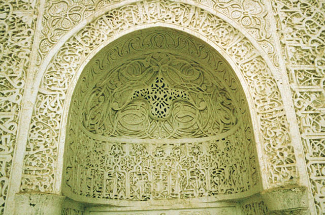 Detail of mihrab; carved stucco hood