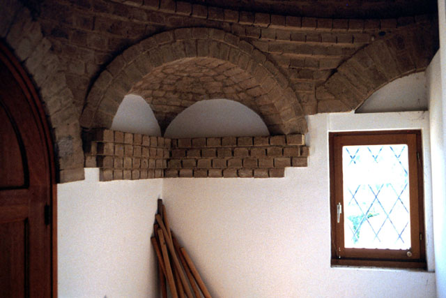 Interior detail showing brick transition to dome