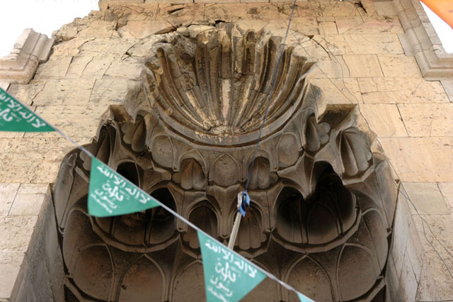 Exterior detail; muqarnas hood of portal