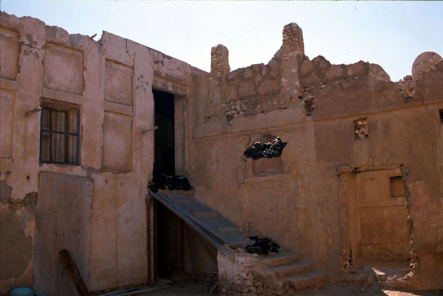 Exterior view of courtyard walls, before restoration