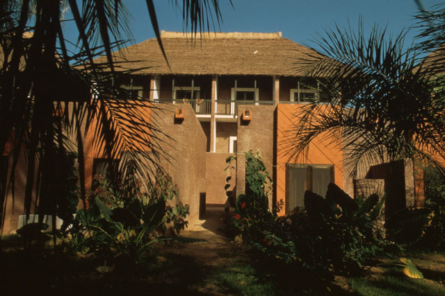Exterior view showing façade with thatched pitched roof