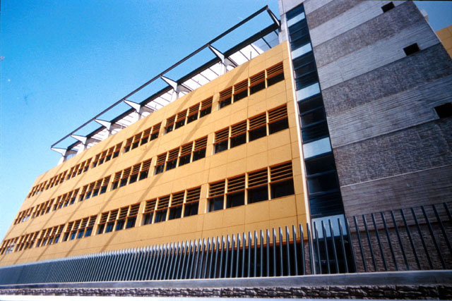 Exterior view showing concrete façade with air-vents