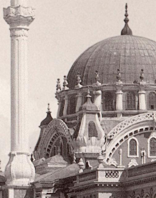 Exterior view from west, showing a mixture of baroque, rococo and empire style ornamentation on the dome, dome arches, weight turrets and minaret