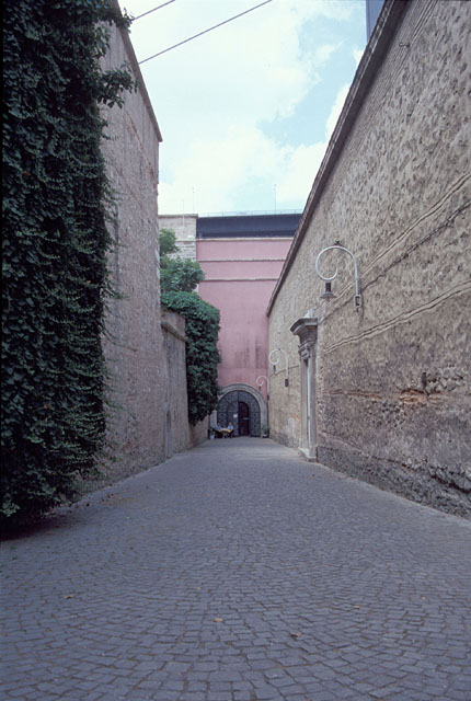 Pathway leading from the palace gate to the tunnel entrance; the palace landwall is seen on the right
