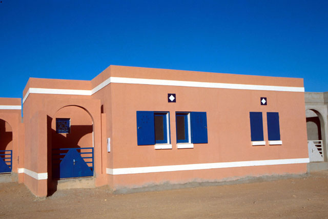 Exterior view showing adobe inspired façade