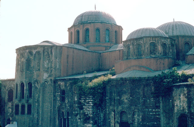 Exterior view from southeast.  Adjoining the southern church that is seen on the left, is the funerary chapel with its two lower domes