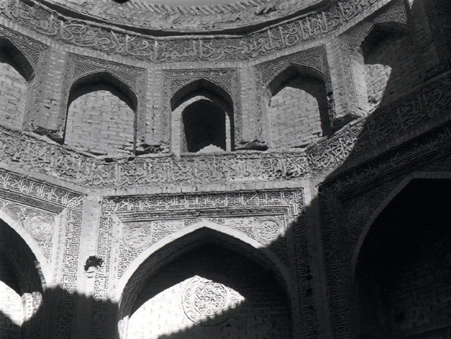 Interior view with zone of transition and upper half of blind arches prior to restoration