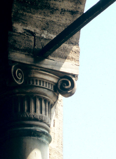 Exterior detail from the open loggia of the Inner Treasury (Iç Hazine) showing embedded capital carrying arch