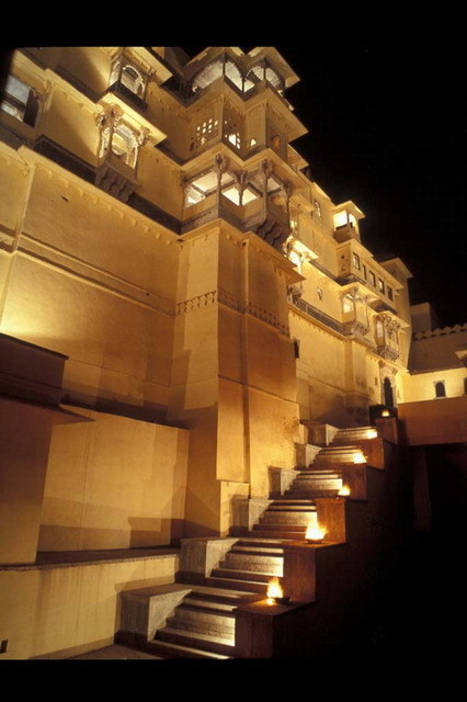 Exterior view, at night, with main stairs