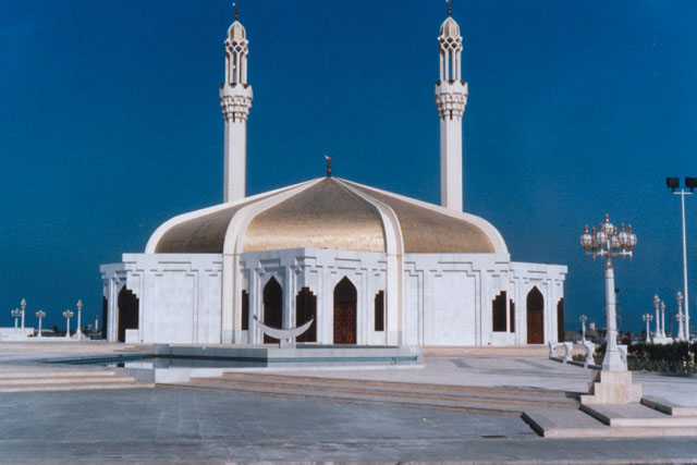 Exterior view showing ornate golden domed roof with exposed ribs