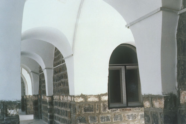 Exterior detail showing plaster covered stone vaulting system