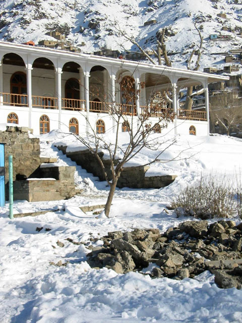 Exterior view from northwest, showing restored pavilion in winter with snow