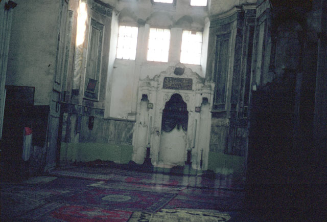 Interior view of the southern church sanctuary, showing marble revetments and baroque mihrab