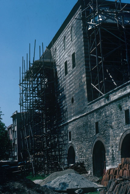 Exterior view showing stone under scaffolding
