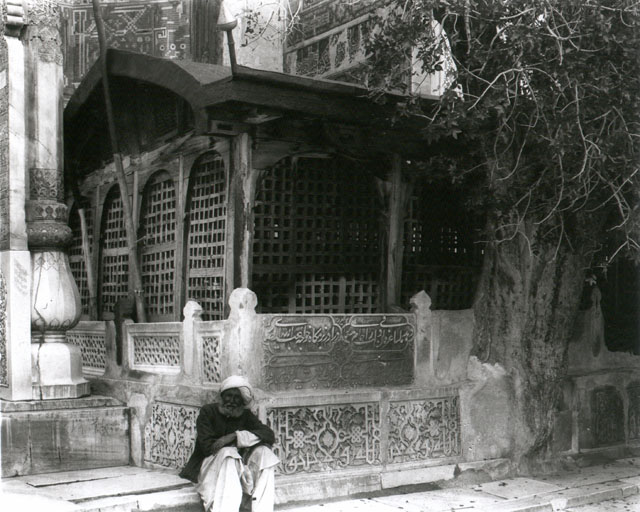 View of Ansari's tomb, set on a decorated platform and enclosed within a wooden structure