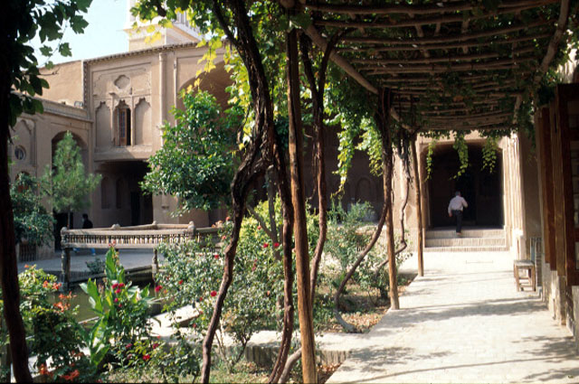 Lari House - Covered passage around the courtyard