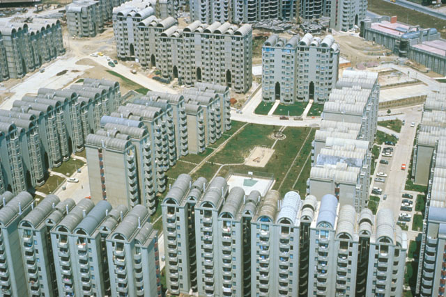 Aerial view showing arrangement around green spaces of modular buildings