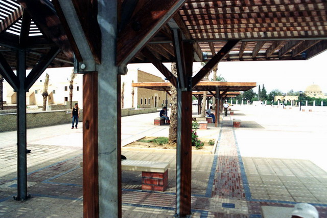 Detail of metal and wood shelter in public square
