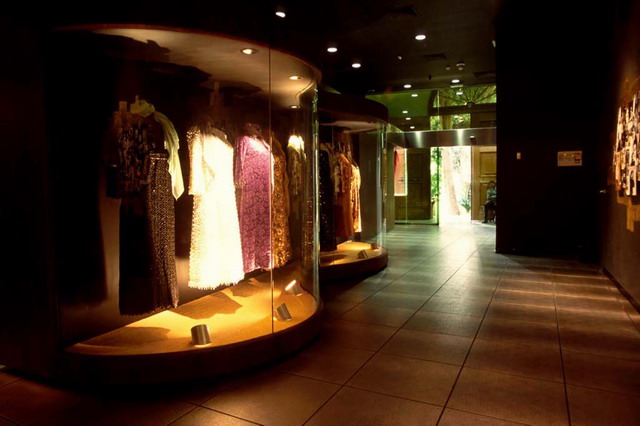 Exhibition hall, costume display with visitor entrance in background
