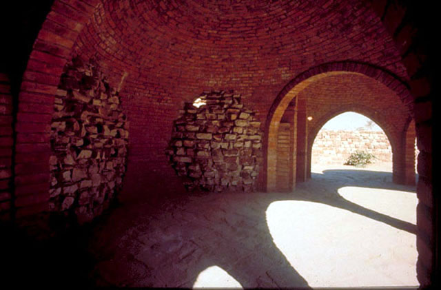 Interior view of domed shelter, showing a series of archways