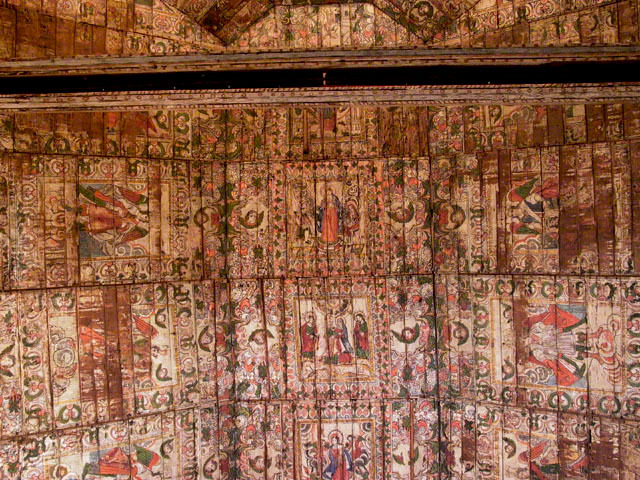 Interior detail view of painted wooden ceiling