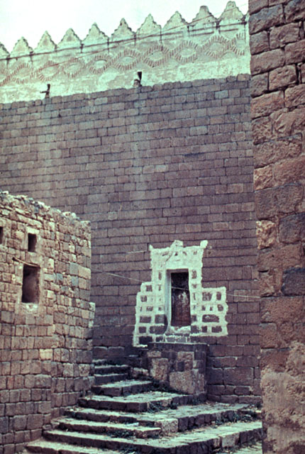 Façade of volcanic masonry
