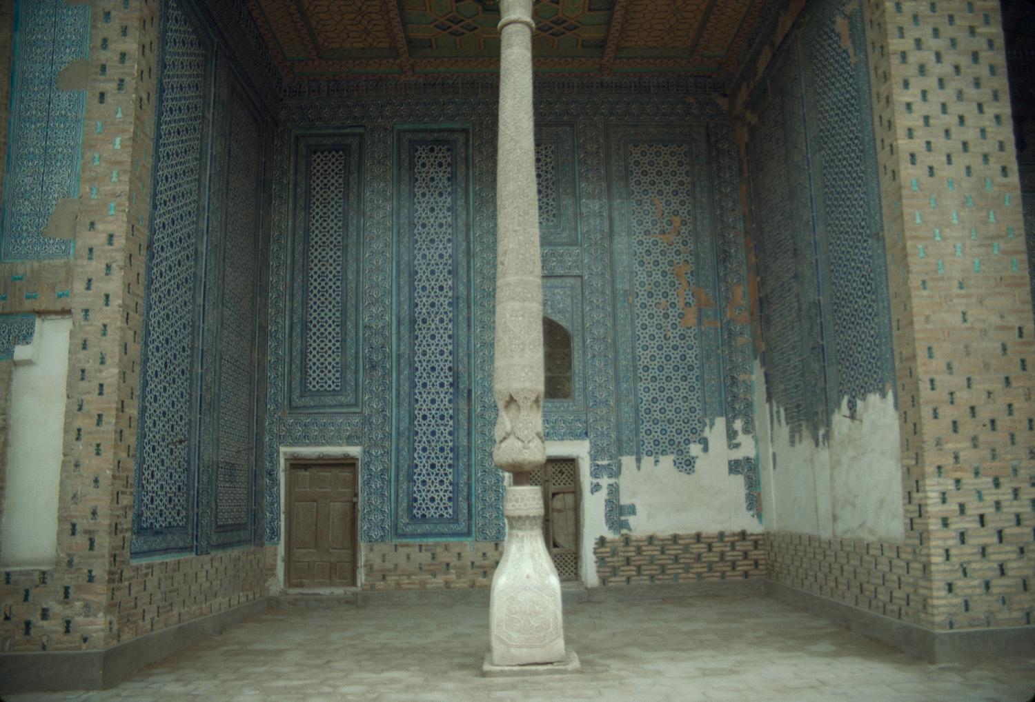Detail from iwan looking at column base and decorated inner walls
