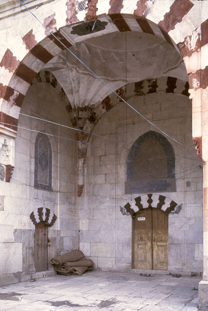 View of entry iwan showing portals of the mosque (right) and the convent room (left)