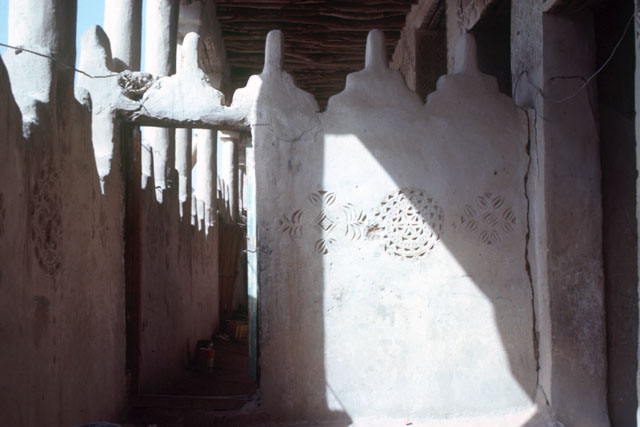 Interior view showing decorative wall carvings
