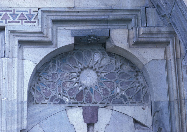 Decorative detail over the western arch of the north façade