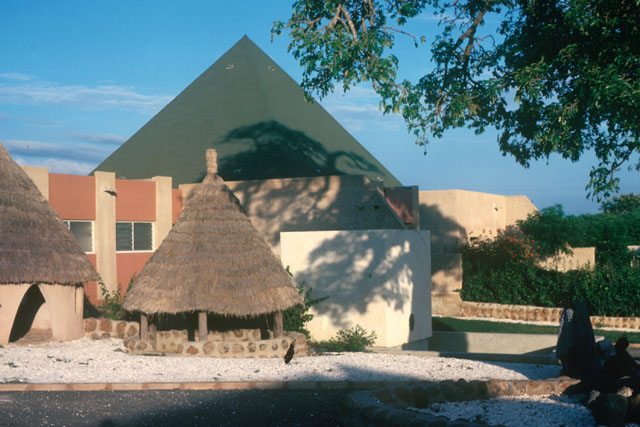 Exterior view showing façade with neighboring tent forms