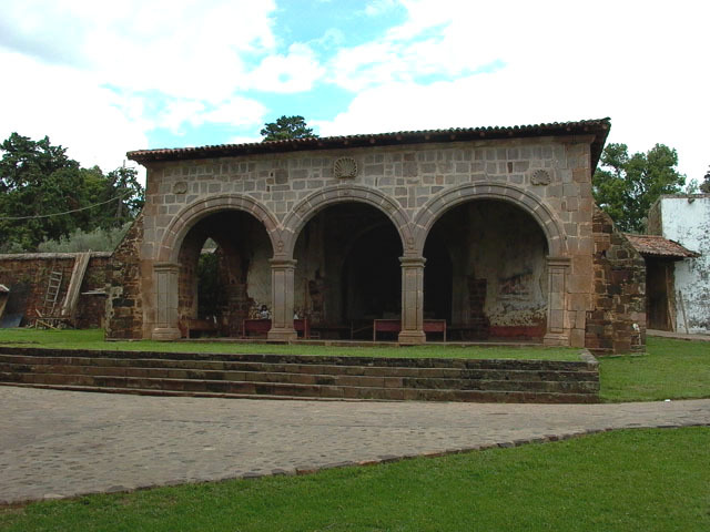 Exterior view of the three arched portico