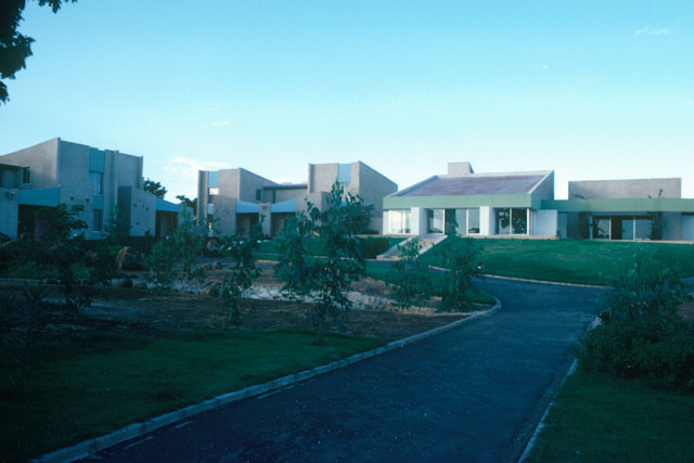 Exterior view showing landscaped setting for modular structures