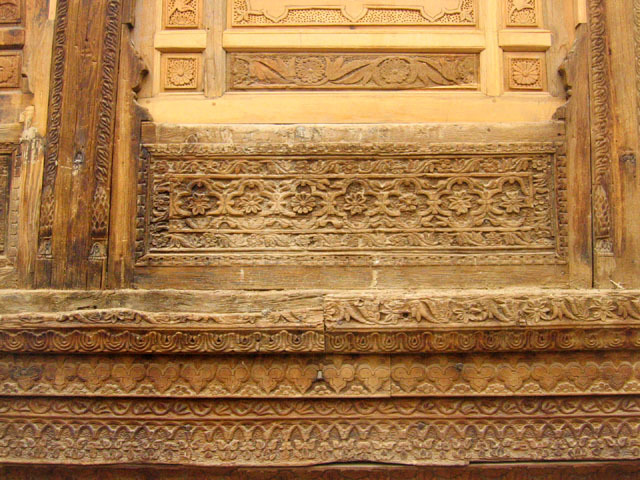 Detail of carved decoration on courtyard elevation, after conservation