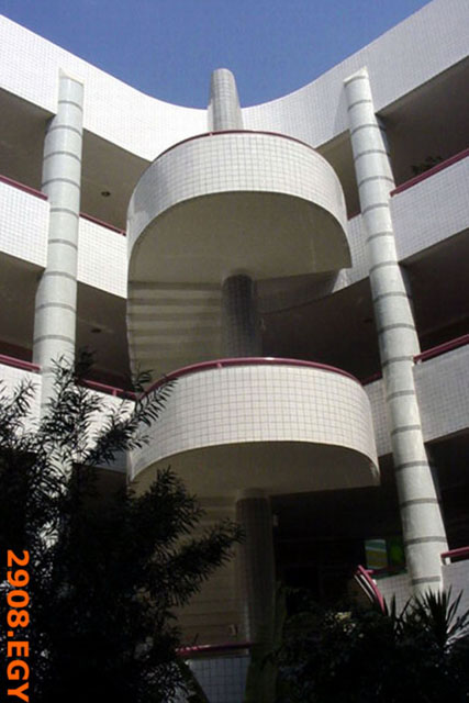 Round, protruding landings of staircases in courtyard