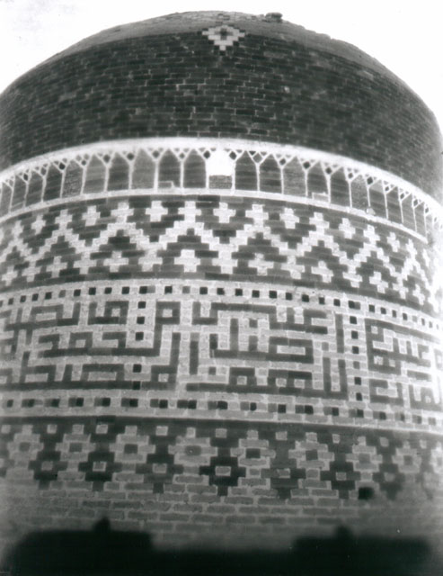 Exterior detail of dome and drum with glazed tile epigraphy and ornament